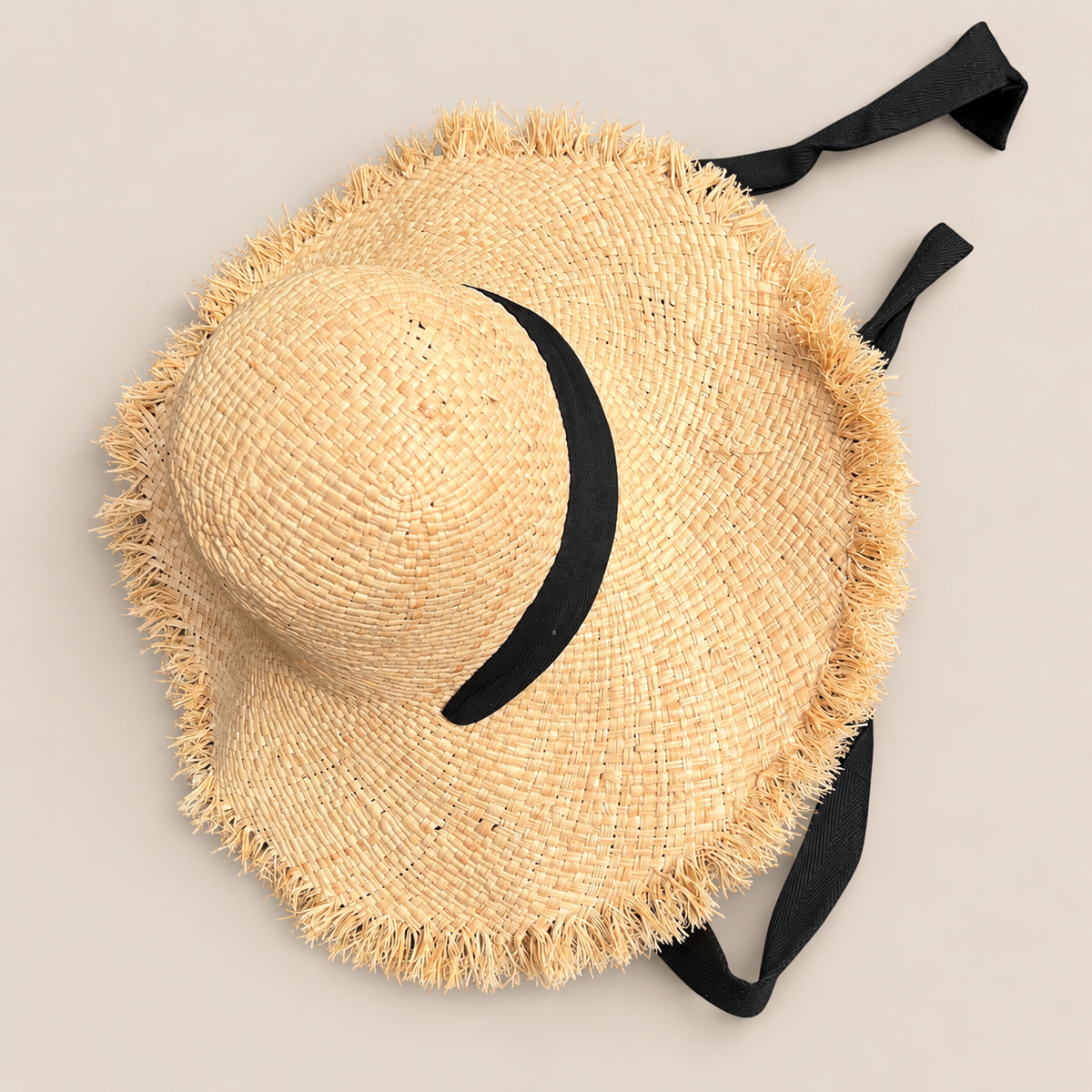 Handwoven Straw Sun Hat: Wide Brim Beach Accessory on a beige backdrop