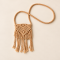 Handmade Woven Tassel Crossbody Bag: Nylon Summer Purse on a beige backdrop