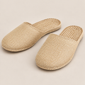 Handmade Woven Straw Slippers: All-Season Spa Shoes on a beige backdrop