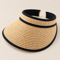 Handmade Straw Sun Visor: Wide Brim, Breathable Summer Hat on a beige backdrop