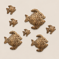 Handmade Fish Nursery Wall Decor, Woven Water Hyacinth Fish Wall Hanging, Coastal Ocean Nursery Decor on a beige backdrop