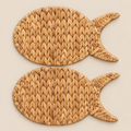 Handmade Fish Placemat, Woven Water Hyacinth Place Mats, Coastal Dining Table Mat on a beige backdrop