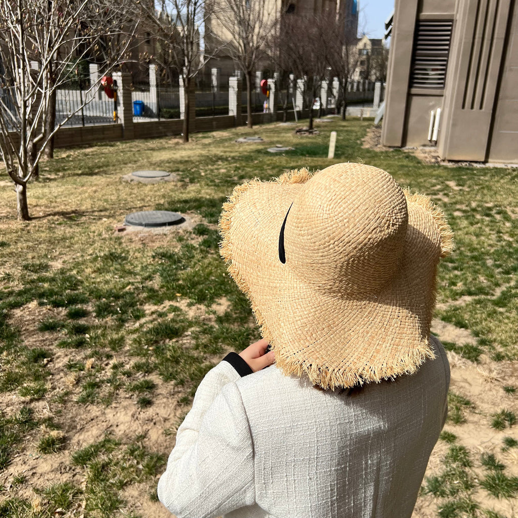 Handwoven Straw Sun Hat: Wide Brim Beach Accessory - view 6