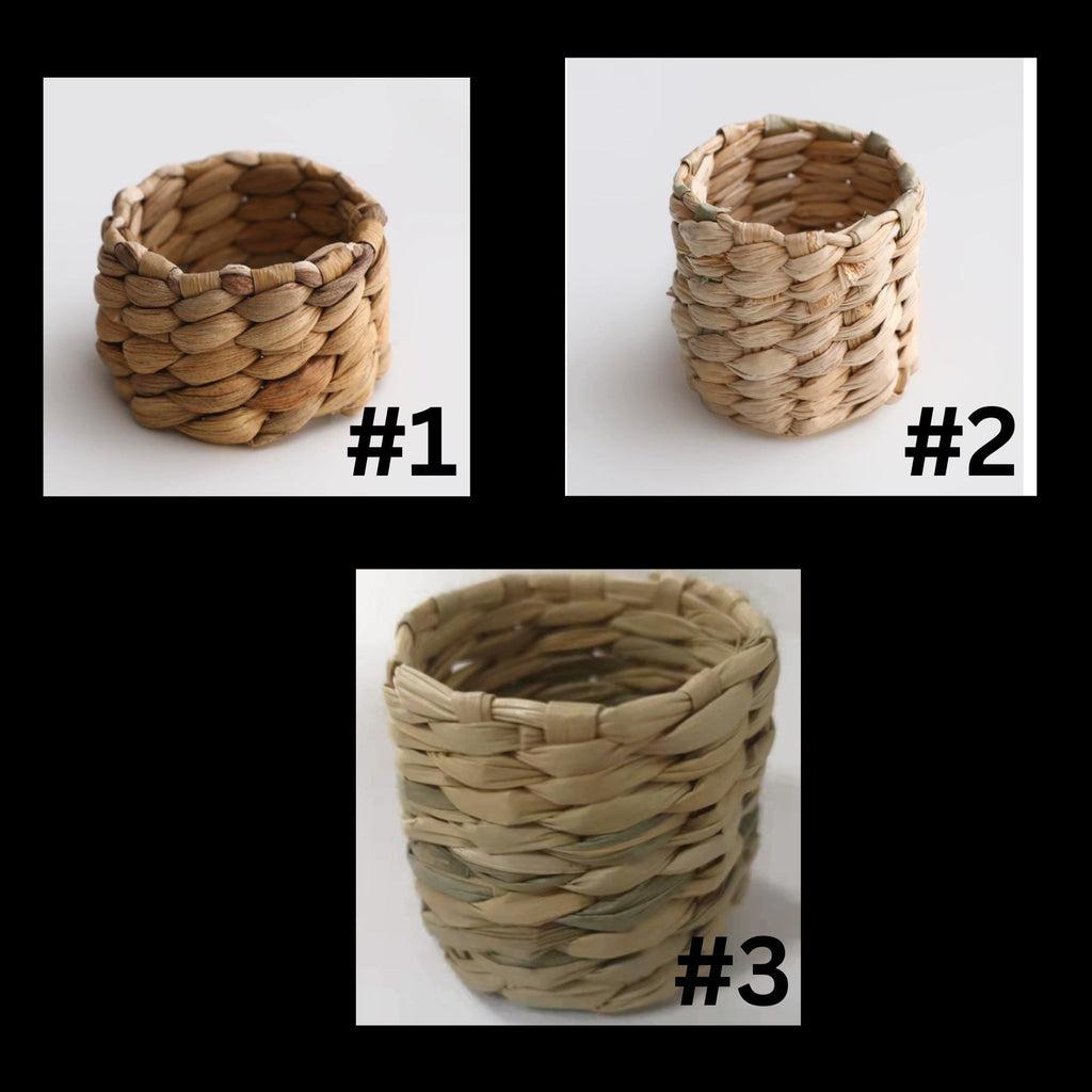 three different woven baskets, each with a unique design and color pattern. The baskets are arranged in a grid-like pattern, with each basket placed in a separate square. The baskets are labeled with the numbers #1, #2, and #3, indicating their respective positions in the arrangement.