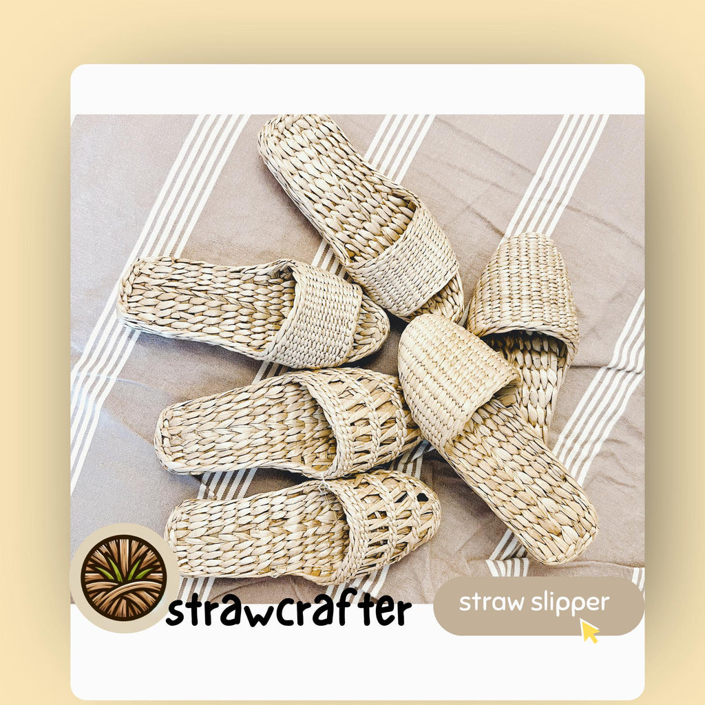 A variety of handmade straw slippers in different open toe and closed toe designs, displayed on a striped fabric. Natural beige color, woven texture. Lightweight, breathable, perfect as house shoes or summer sandals.