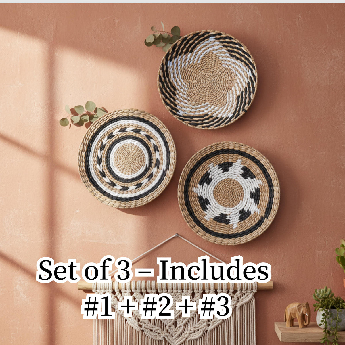 A set of three decorative woven baskets hanging on a wall, with a macrame wall hanging below them.