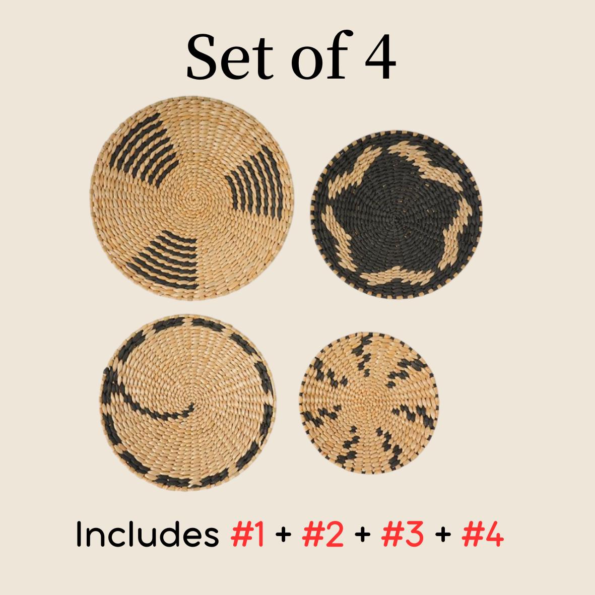 four woven baskets with distinct patterns, arranged in a set of four.
