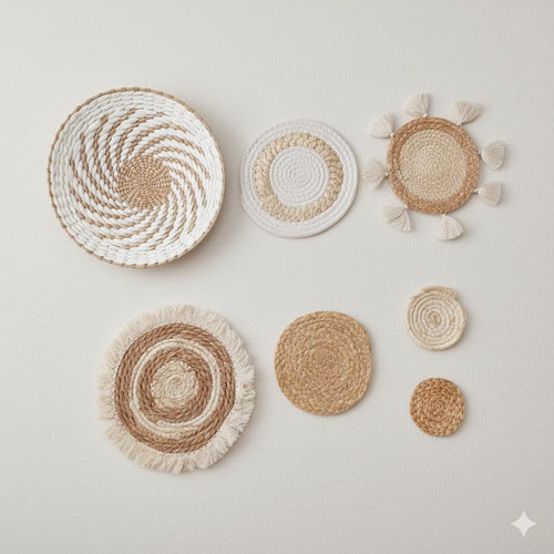 a collection of woven baskets and coasters arranged on a white background.