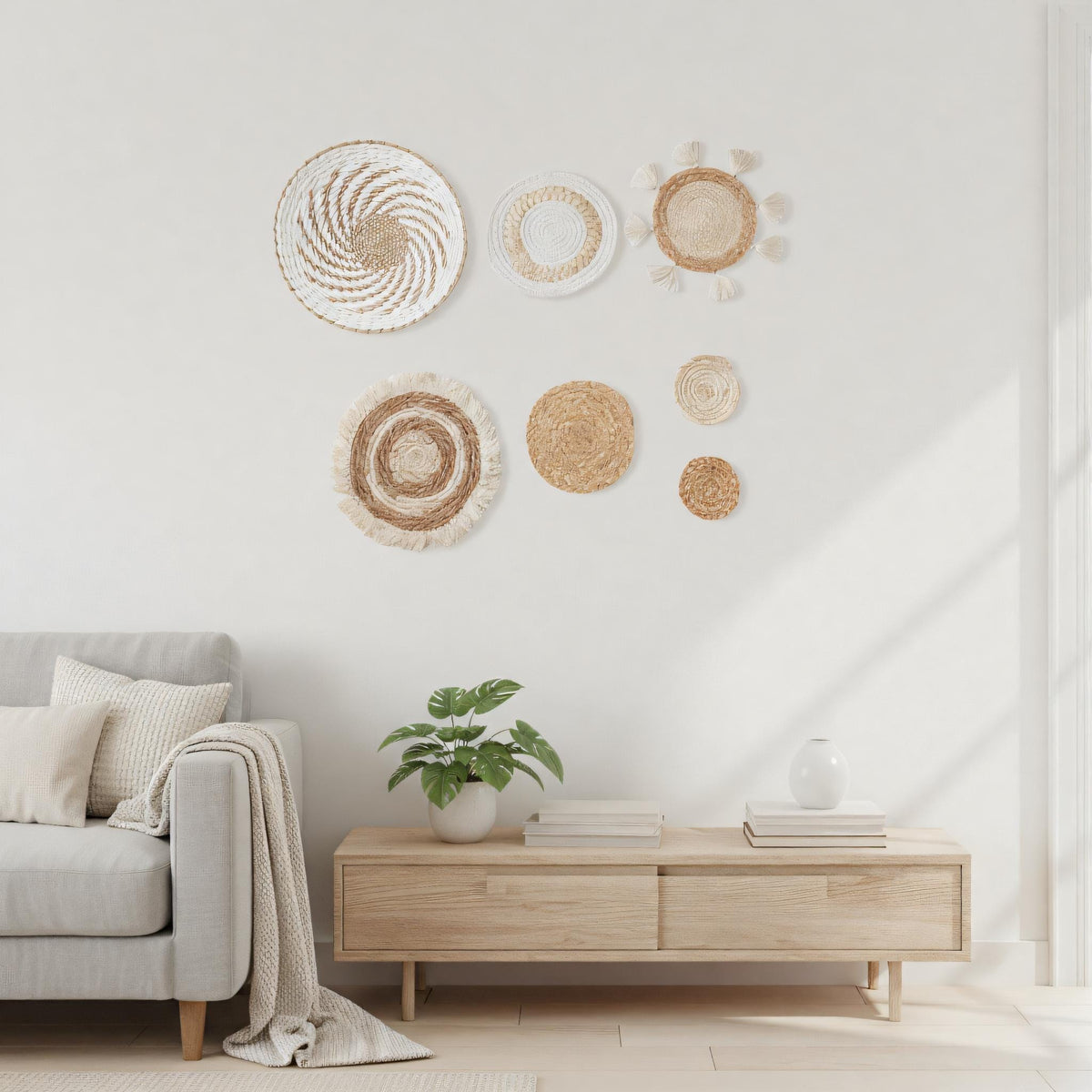 a cozy living room with a gray sofa, a wooden side table, and a potted plant. The wall is decorated with a collection of woven baskets and plates, creating a visually appealing and harmonious space.