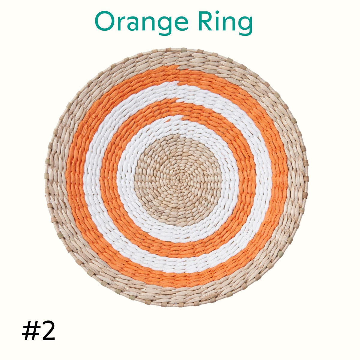 a round woven basket with a circular pattern of orange and white stripes.