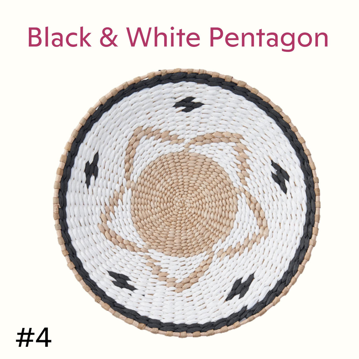 A woven basket with a white and black pattern, featuring a central design and four smaller designs surrounding it.