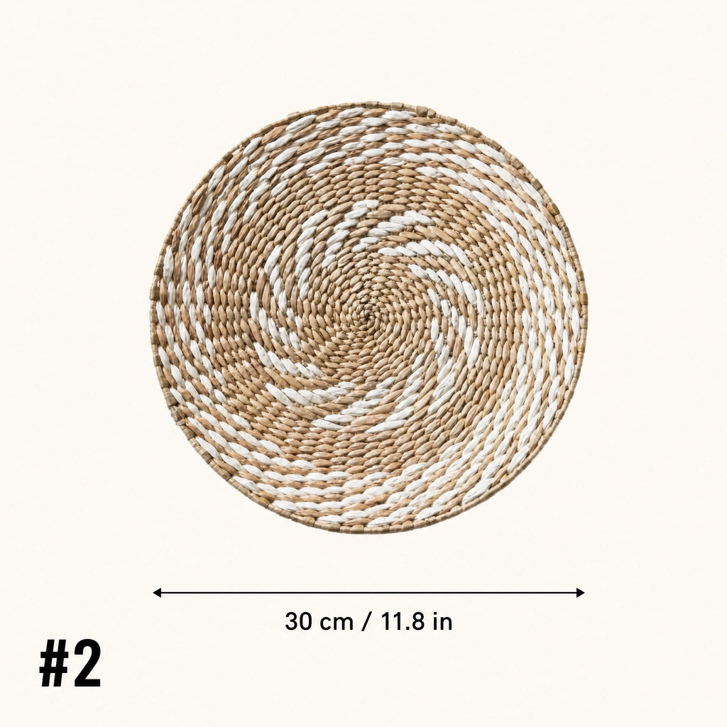 a woven basket with a spiral pattern, and it is approximately 30 cm (11.8 in) in diameter.