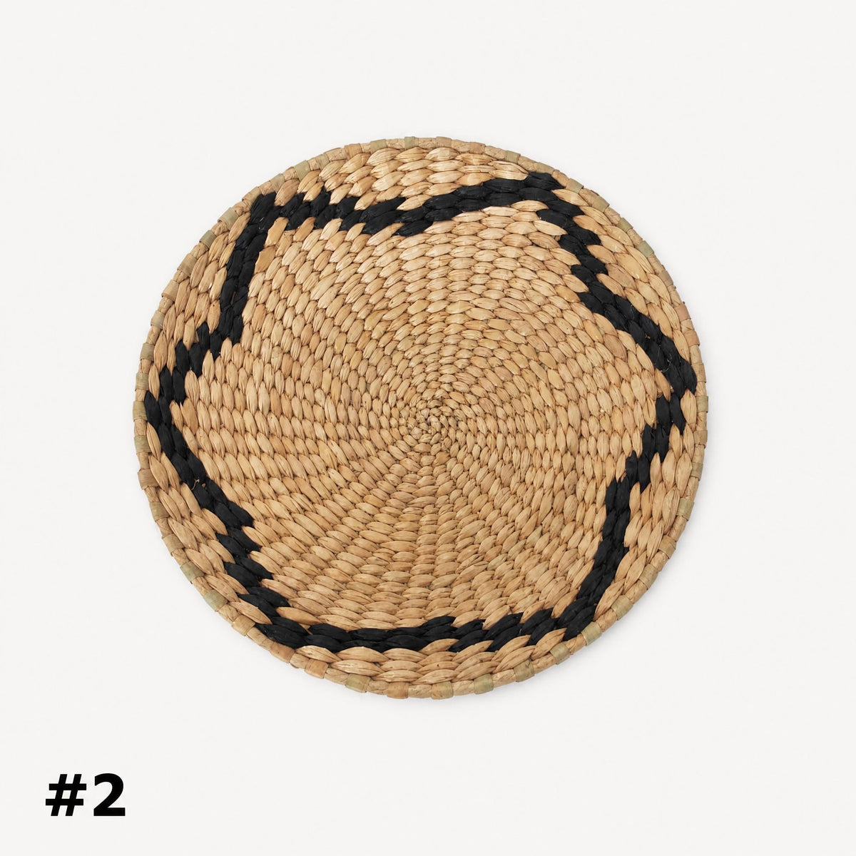 A woven basket with a black border, placed against a white background.
