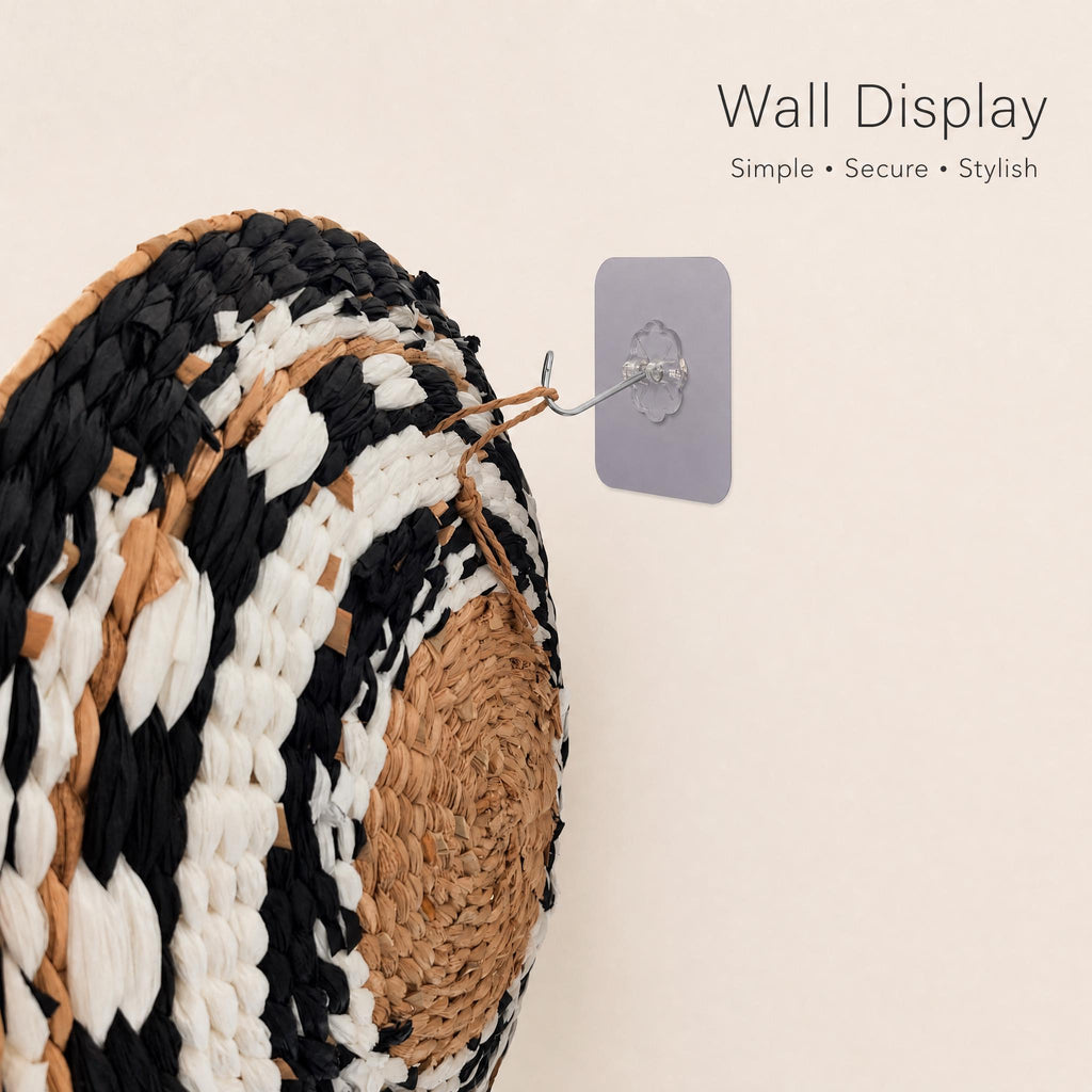 a wall display with a woven basket or mat hanging on it. The display is simple, secure, and stylish, with a neutral color palette and a text overlay that reads "Wall Display" and "Simple + Secure + Stylish".