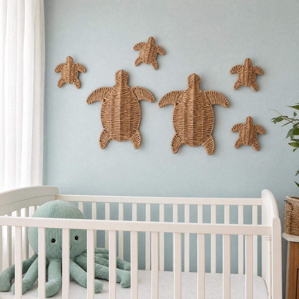 A white crib with a green stuffed octopus toy in a nursery setting, featuring a wall with six woven turtle-shaped wall decorations.