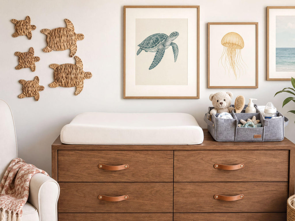a well-organized nursery room with a wooden dresser, a changing pad, and various decorative elements such as framed pictures and a teddy bear.