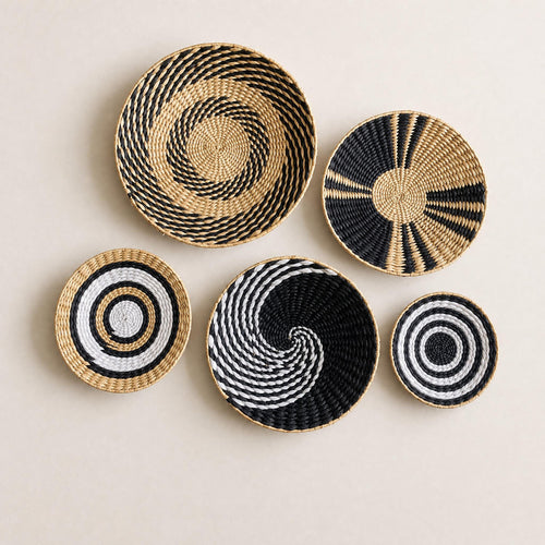 Handmade woven cattail wall basket set of 5 in black, white and natural tan geometric patterns for boho living room and rustic home decor