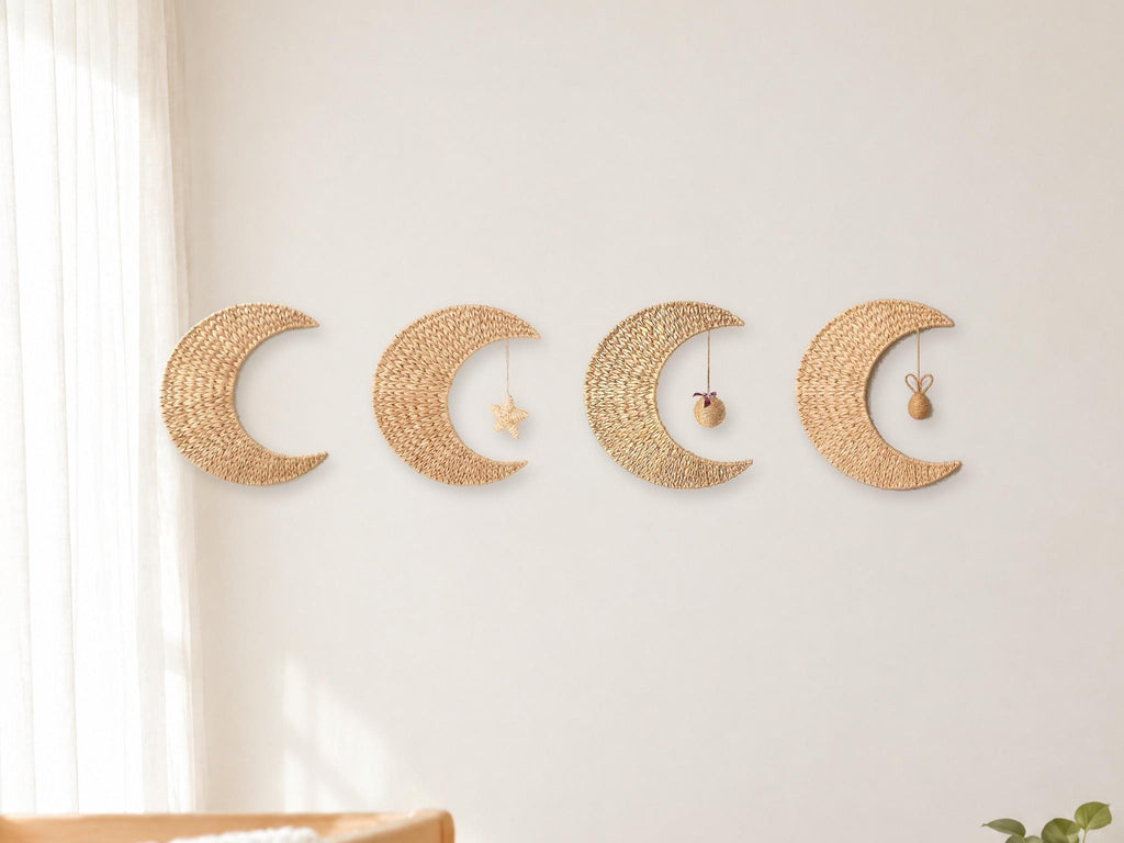 Handwoven water hyacinth and corn husk crescent moon wall decor on a nursery wall, four styles shown side by side: moon only, moon with star, Xmas ball and rabbit ball; each option is one moon